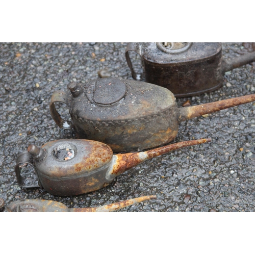 787 - FIVE VINTAGE OIL CANS