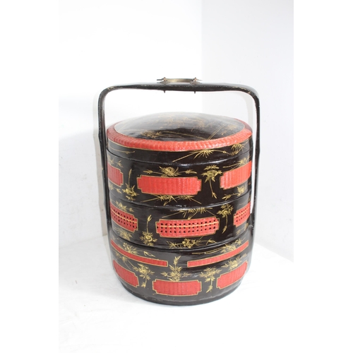 462 - ORIENTAL LACQUER THREE TIERED WEDDING BASKET
56 X 39CM