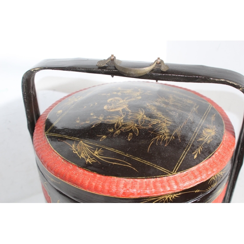 462 - ORIENTAL LACQUER THREE TIERED WEDDING BASKET
56 X 39CM