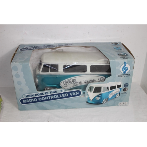 541 - RADIO CONTROL VW CAMPER IN BOX AND TWO OTHERS 
45 X 20CM