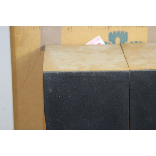 557 - PAIR OF BOXED CASTLES SPEAKERS