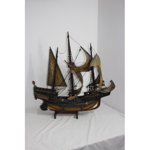 460 - LARGE VINTAGE MODEL OF A WOOD AND CANVAS GALLEON
70 X 75CM