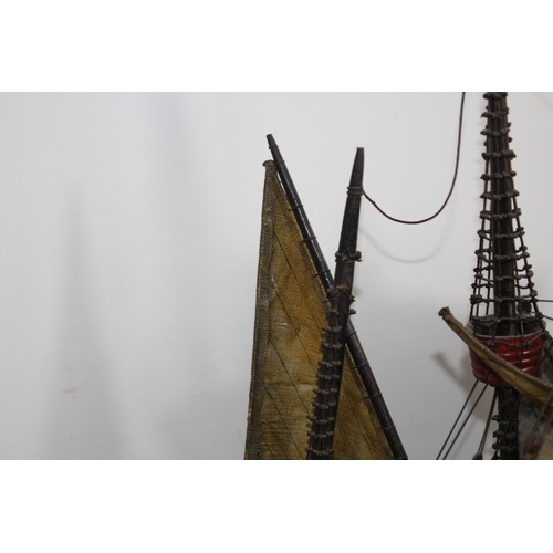 460 - LARGE VINTAGE MODEL OF A WOOD AND CANVAS GALLEON
70 X 75CM