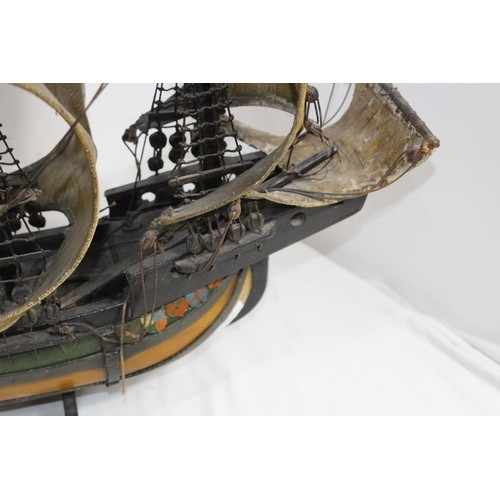 460 - LARGE VINTAGE MODEL OF A WOOD AND CANVAS GALLEON
70 X 75CM