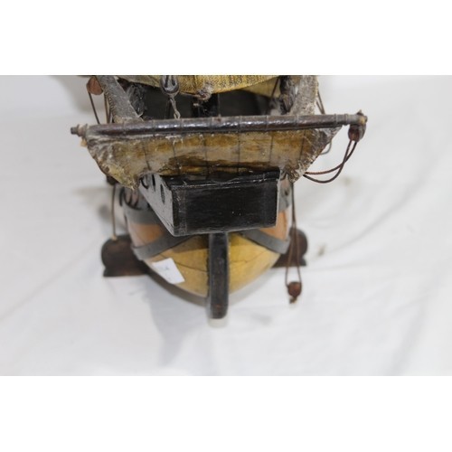 460 - LARGE VINTAGE MODEL OF A WOOD AND CANVAS GALLEON
70 X 75CM