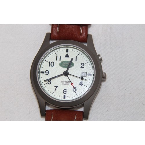 819 - ST MORITZ LAND ROVER SOLID TITANIUM WR 100M ALARM BROWN LEATHER WATCH