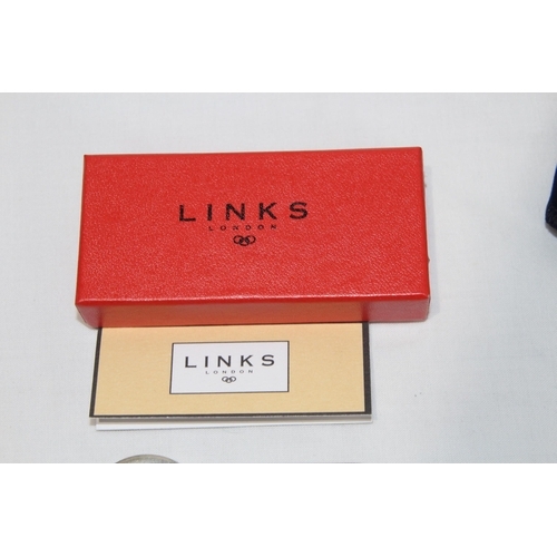 834 - BOXED SILVER LINKS OF LONDON CONCORDE KEYRING
29.84G