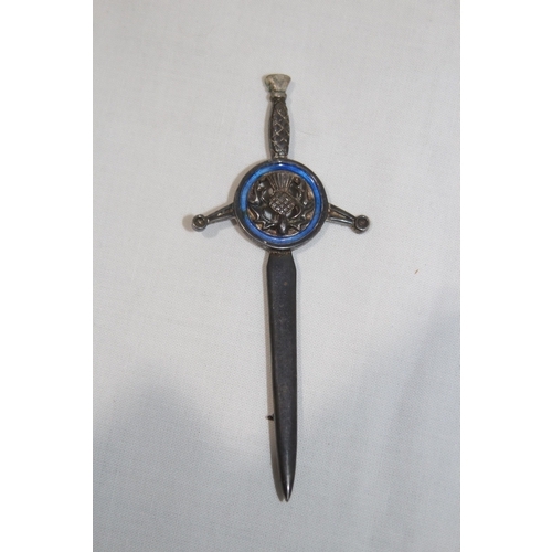 835 - VINTAGE SCOTTISH SWORD BROOCH, KUKRI BROOCH AND A LION