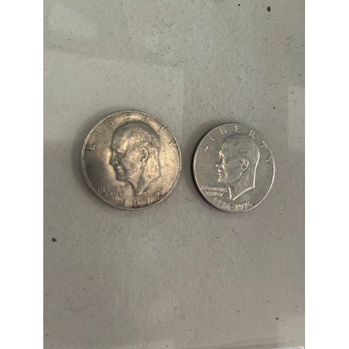 134 - Two American One Dollar Coins.