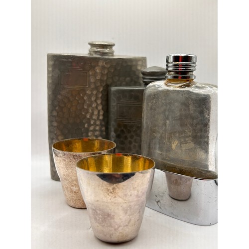 1 - Three Vintage Hip Flasks Along with a Pair Of Plated Shot Beakers.