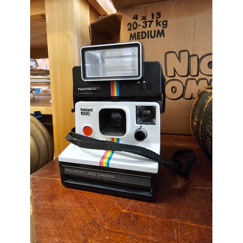 204 - Polaroid Instant 1000 Camera.