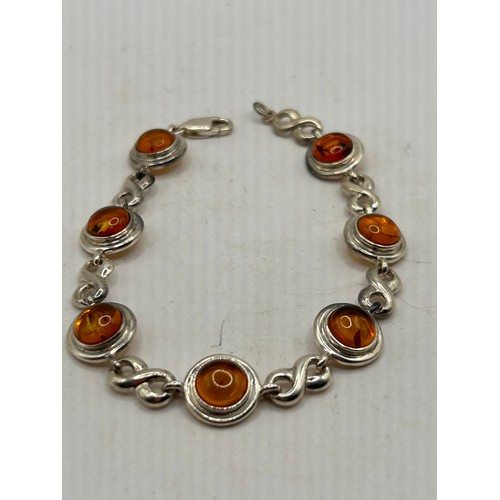 38 - Silver And Amber Bracelet .