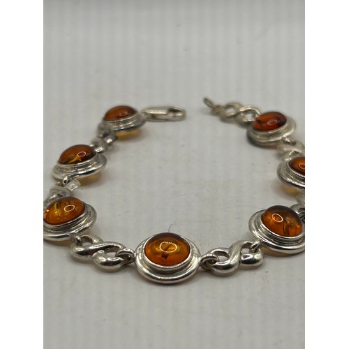 38 - Silver And Amber Bracelet .