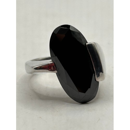 47 - Attractive Silver Ring With Black Stone.