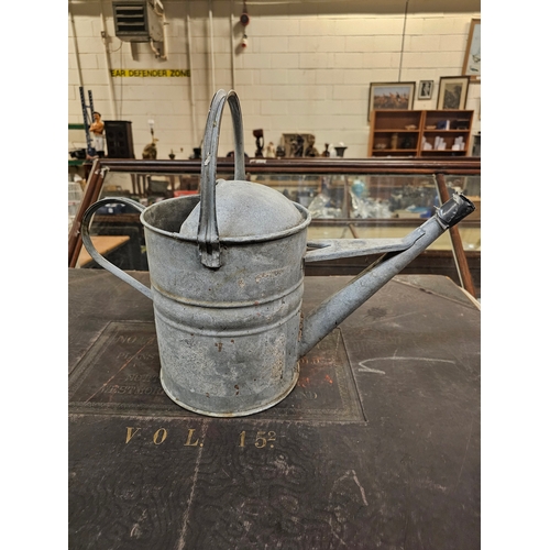 390 - Galvanised Watering Can.