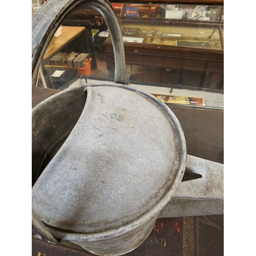 390 - Galvanised Watering Can.