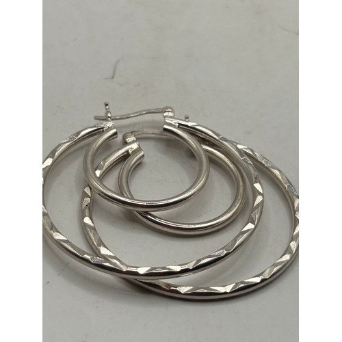 259 - Pair Of Silver Double Loop Earrings.