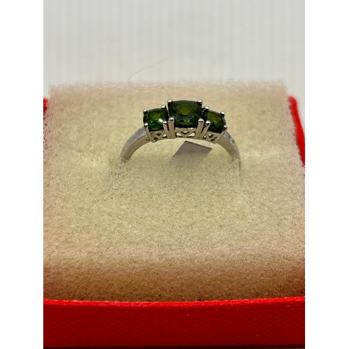 54 - Silver Ring With Three Green Stones.