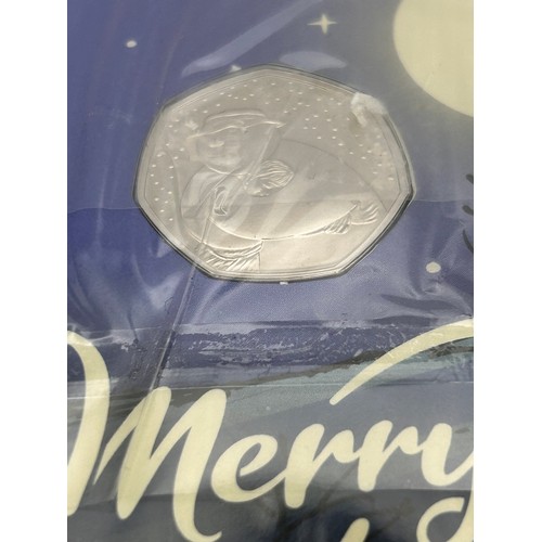 70 - The Snowman Card And Uncirculated 50p.