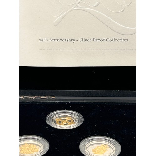 23 - Royal Mint Boxed Silver Proof £1 Coin Set.
25th Anniversary.