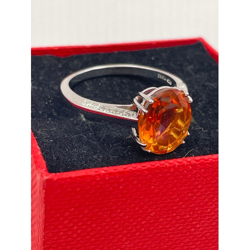 250 - Silver Ring With Large Orange Oval Stone.