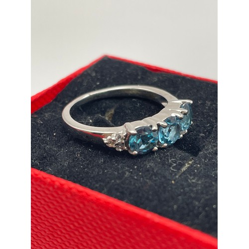 257 - Silver Ring With Three Blue Stones.