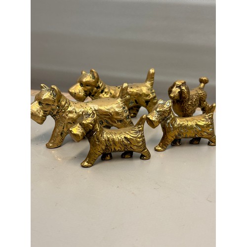 362 - Collection Of Five Brass Dog Figures.