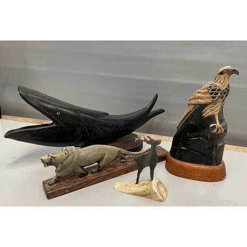 389 - Four Carved Horn Animals.