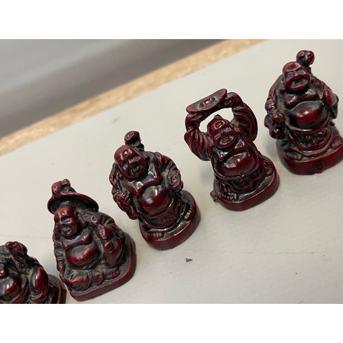 394 - Six Miniature Buddha Figures.