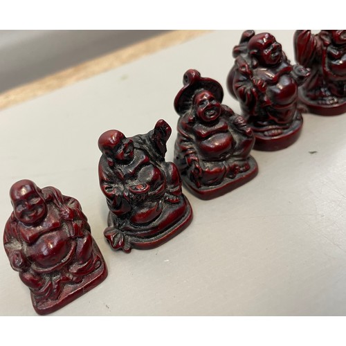 394 - Six Miniature Buddha Figures.