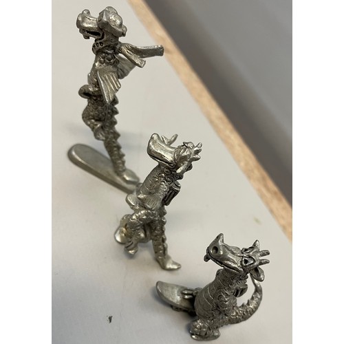 395 - Four White Metal Novelty Miniature Dragon Figures.