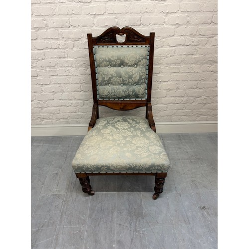 604 - Large Upholstered Chair on Castors