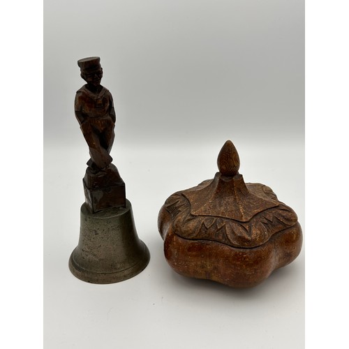 43 - Two Interesting Pieces Of Treen, A Carved Lidded Pot Along With Hand Carved Bell.