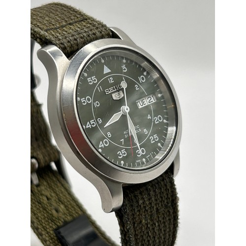 53 - Military Style Seiko 5 Automatic Watch On Canvas Strap, With Exhibition Back.