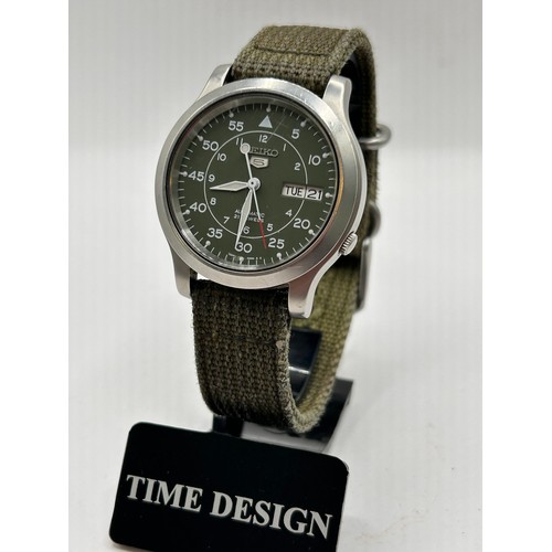 53 - Military Style Seiko 5 Automatic Watch On Canvas Strap, With Exhibition Back.