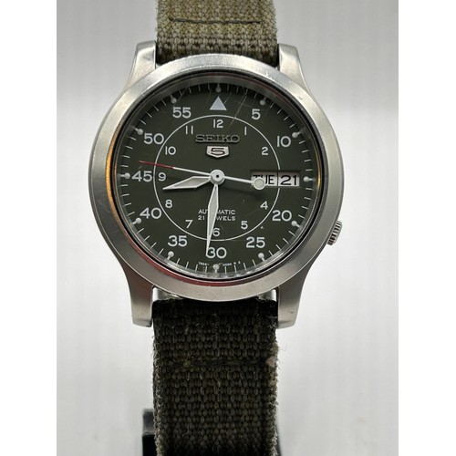 53 - Military Style Seiko 5 Automatic Watch On Canvas Strap, With Exhibition Back.