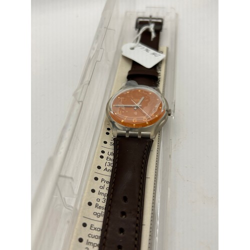 62 - 1996 Vintage Swatch, Box Papers, Running, Appears Unworn With Dial Cover In Place.