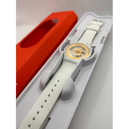 63 - White And Gold Swatch, Box Papers, Running, Appears Unworn With Dial Cover In Place.