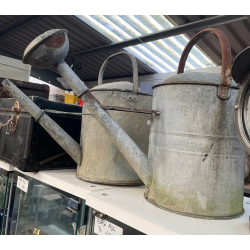 Two Galvanised Watering Cans.