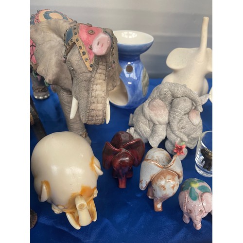 25 - Tray Of Various Elephant Themed Figures And Ceramics.