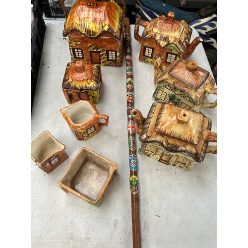 645 - Novelty Pots and Containers With A Walking Stick Full of Place Badges