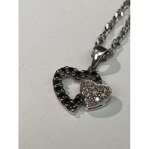 49 - Lovely 9ct White Gold Bracelet With Heart Shaped Pendant With Black And White Diamonds.