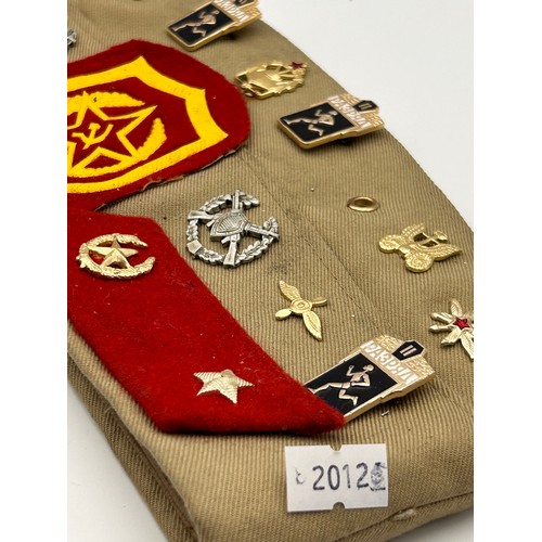 656 - Military Cap With Cloth Badges And Pin Badges.