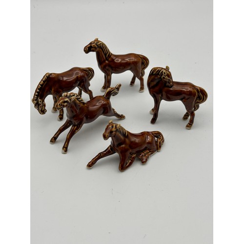 676 - A Collection Of Little Ceramic Horse Figures Standing Approx 2