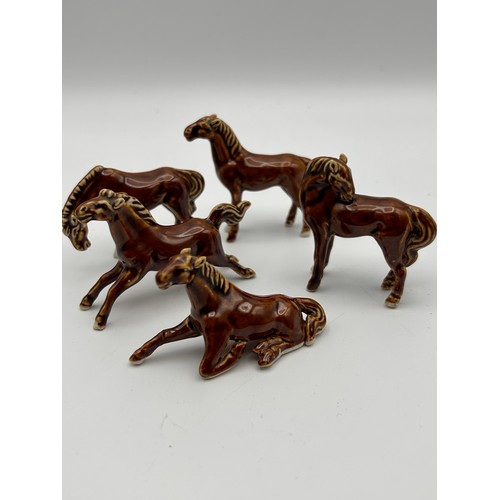 676 - A Collection Of Little Ceramic Horse Figures Standing Approx 2