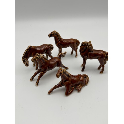 676 - A Collection Of Little Ceramic Horse Figures Standing Approx 2