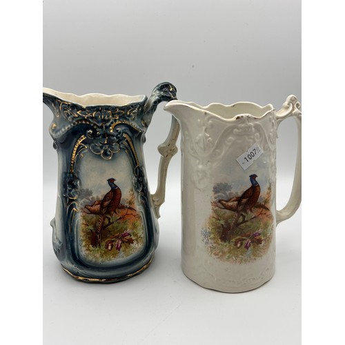 704 - Pair Of Vintage Pheasant Related Jugs, Tallest Being 7