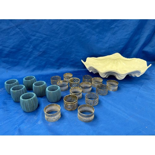 260 - Ceramic Shell Containing Various Napkin Rings.