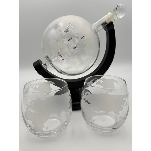 714 - Interesting Atlas Themed Decanter And Glass Set.