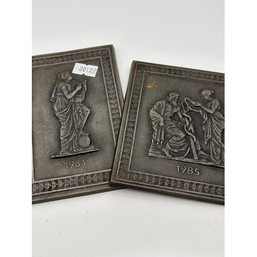 737 - Pair Of Buderus Iron Wall Plaques, Largest 5.5